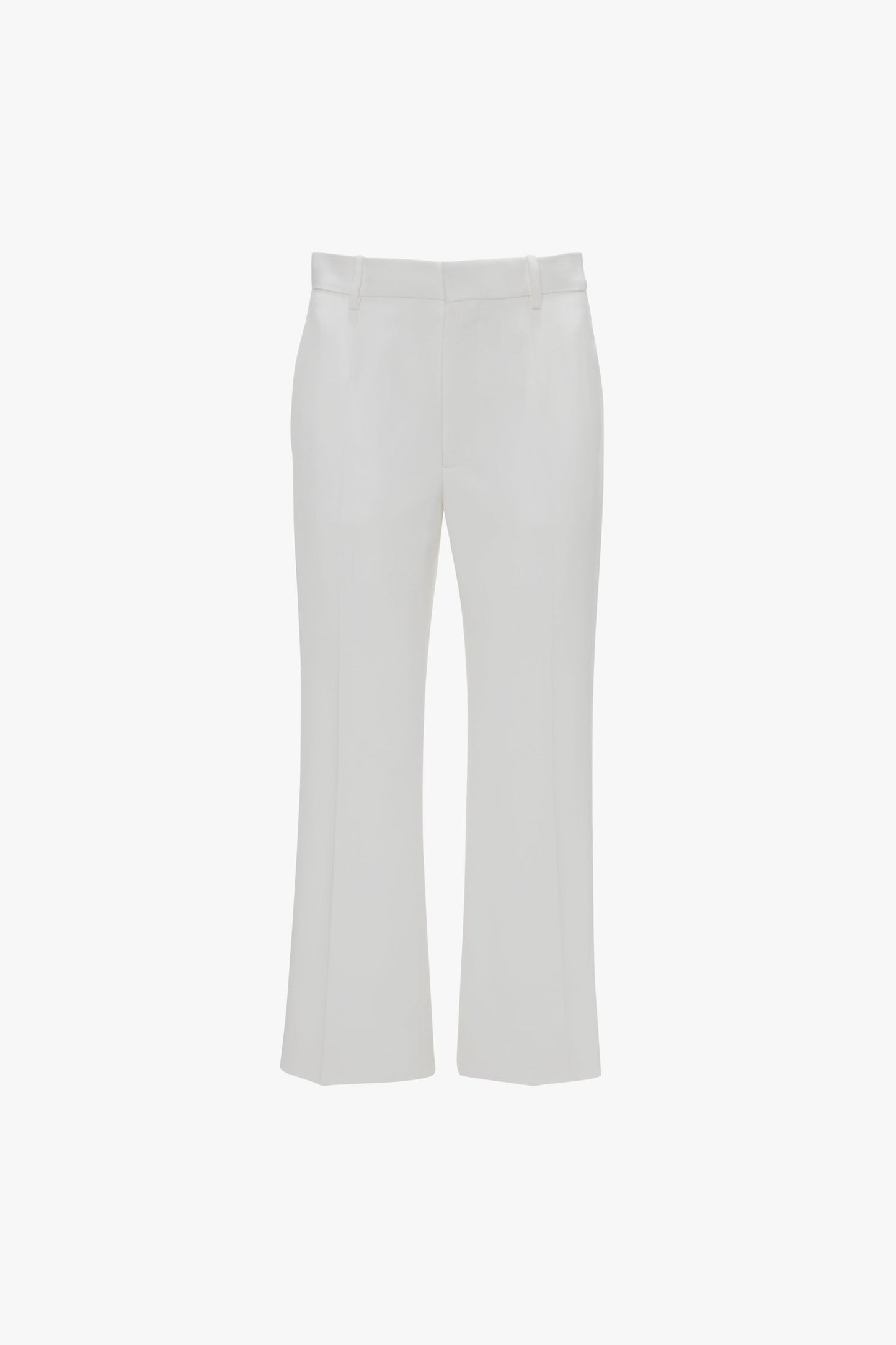 A pair of Victoria Beckham Exclusive Cropped Tuxedo Trouser In Ivory with tailored high waist, belt loops, front zipper, and pockets, displayed against a plain white background.