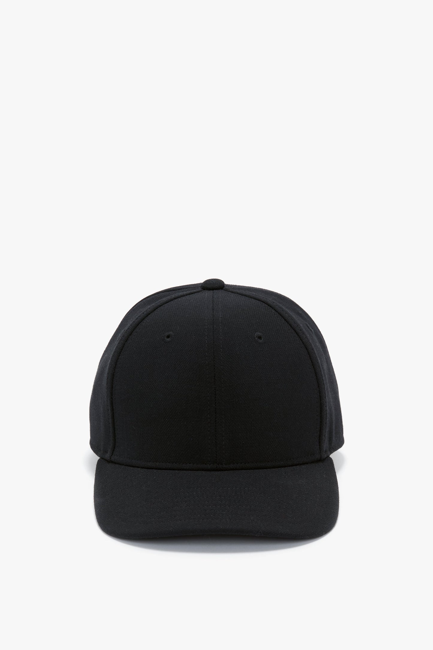 Front view of a plain black Victoria Beckham Exclusive Logo Cap isolated on a white background.