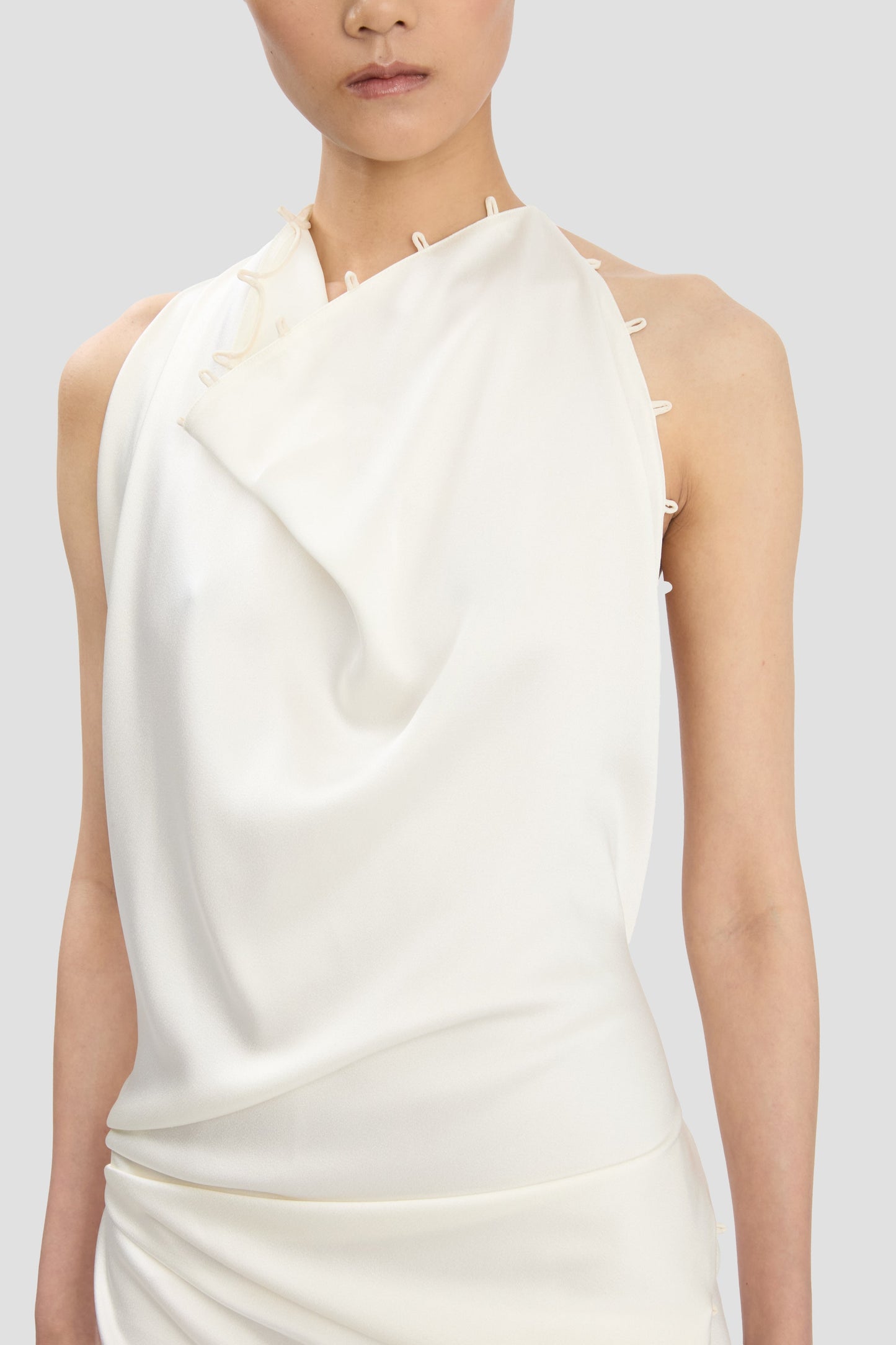 Rouleaux Detail Sleeveless Gown In Ivory