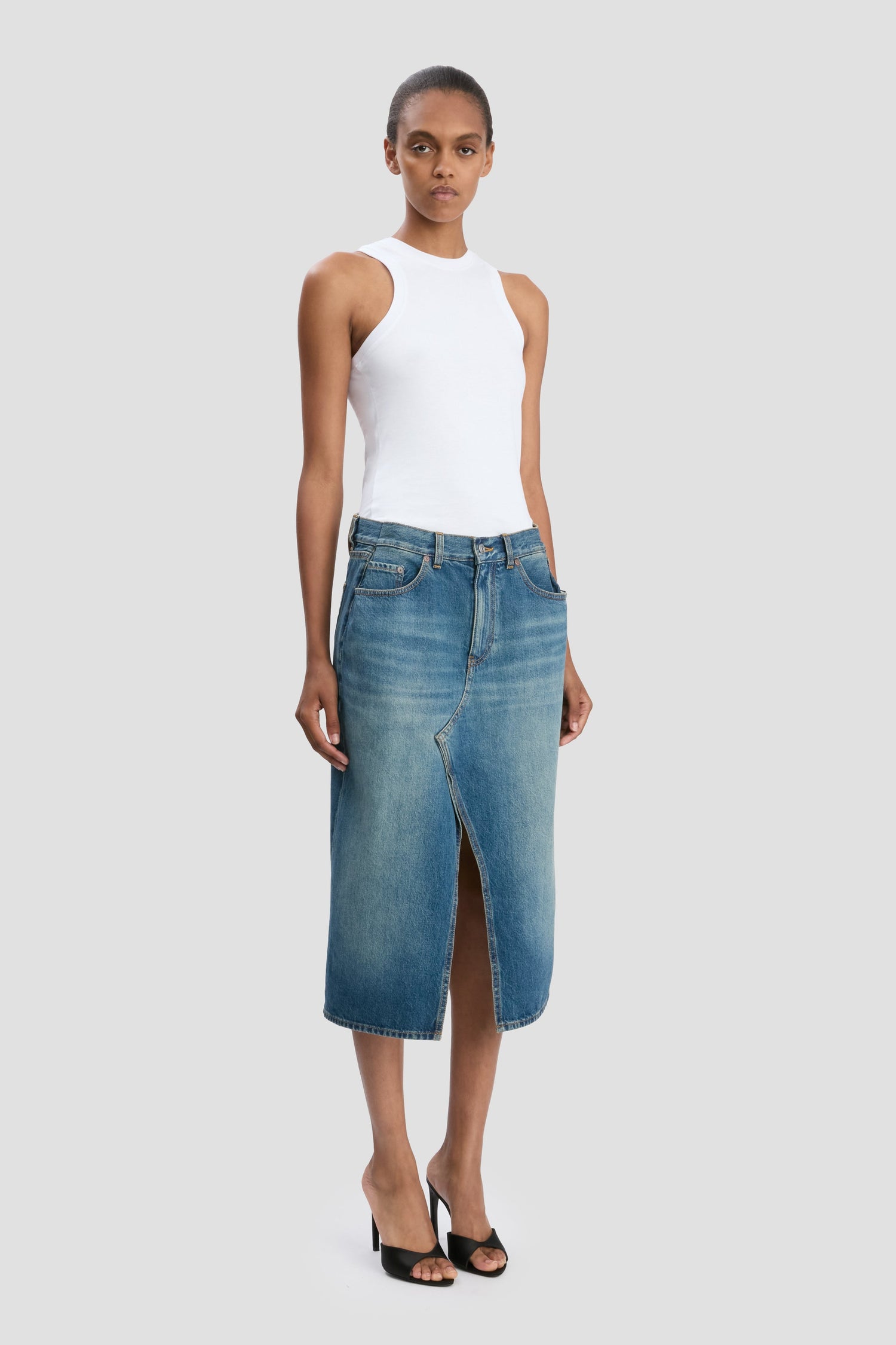 Kick Pocket Denim Skirt In Mid Blue Wash