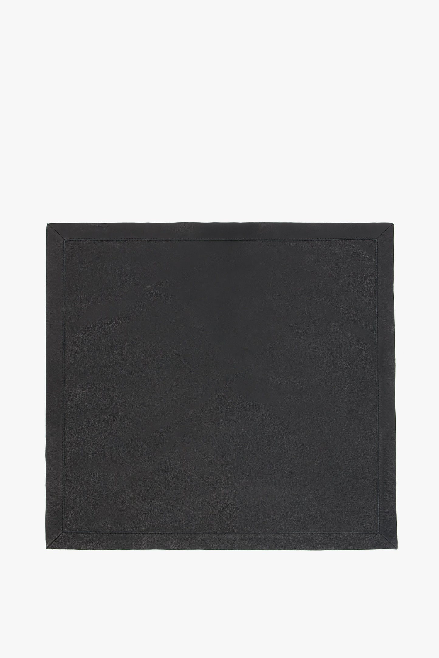 A rectangular, classic Leather Scarf In Black by Victoria Beckham with a simple, plain design and stitched border, crafted from supple leather, set against a white background.