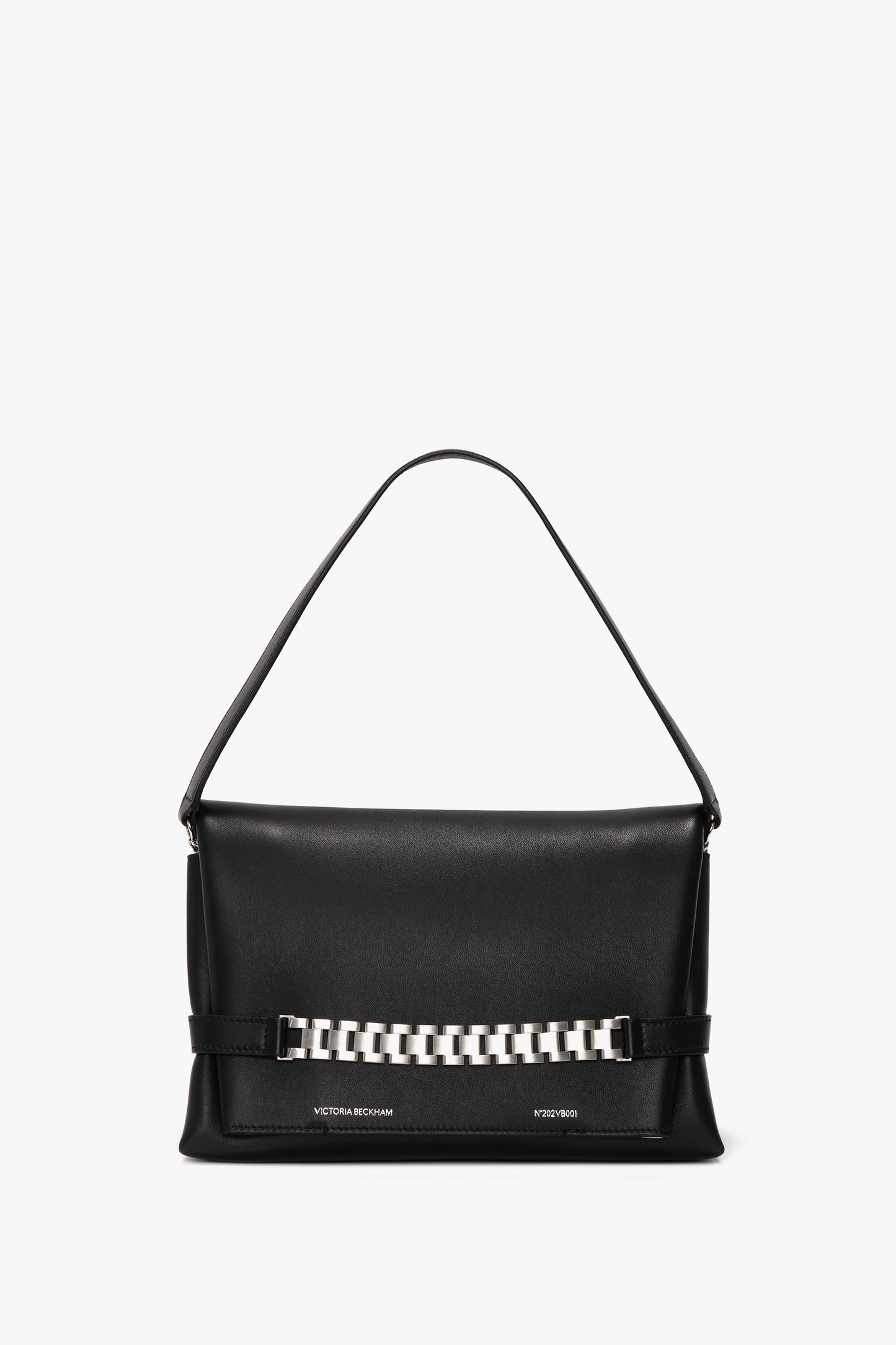 A Chain Pouch Bag with Brushed Silver Chain In Black Leather by Victoria Beckham, featuring a single handle and a brushed silver chain detail on the front, and a detachable strap for versatile styling.