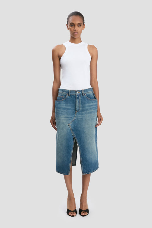 Kick Pocket Denim Skirt In Mid Blue Wash
