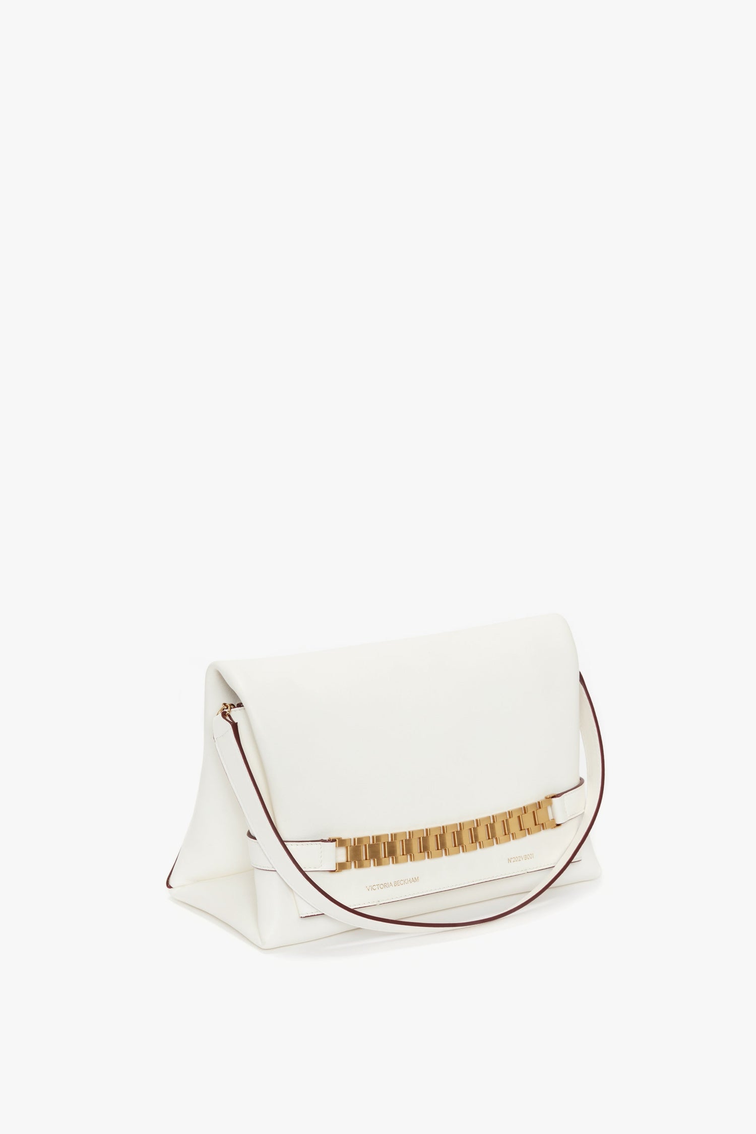 A Chain Pouch Bag With Strap In White Leather from Victoria Beckham, featuring a gold-tone chain and gold metallic accent, crafted from tactile Nappa leather. Shown on a white background, it features a detachable strap for versatile styling.