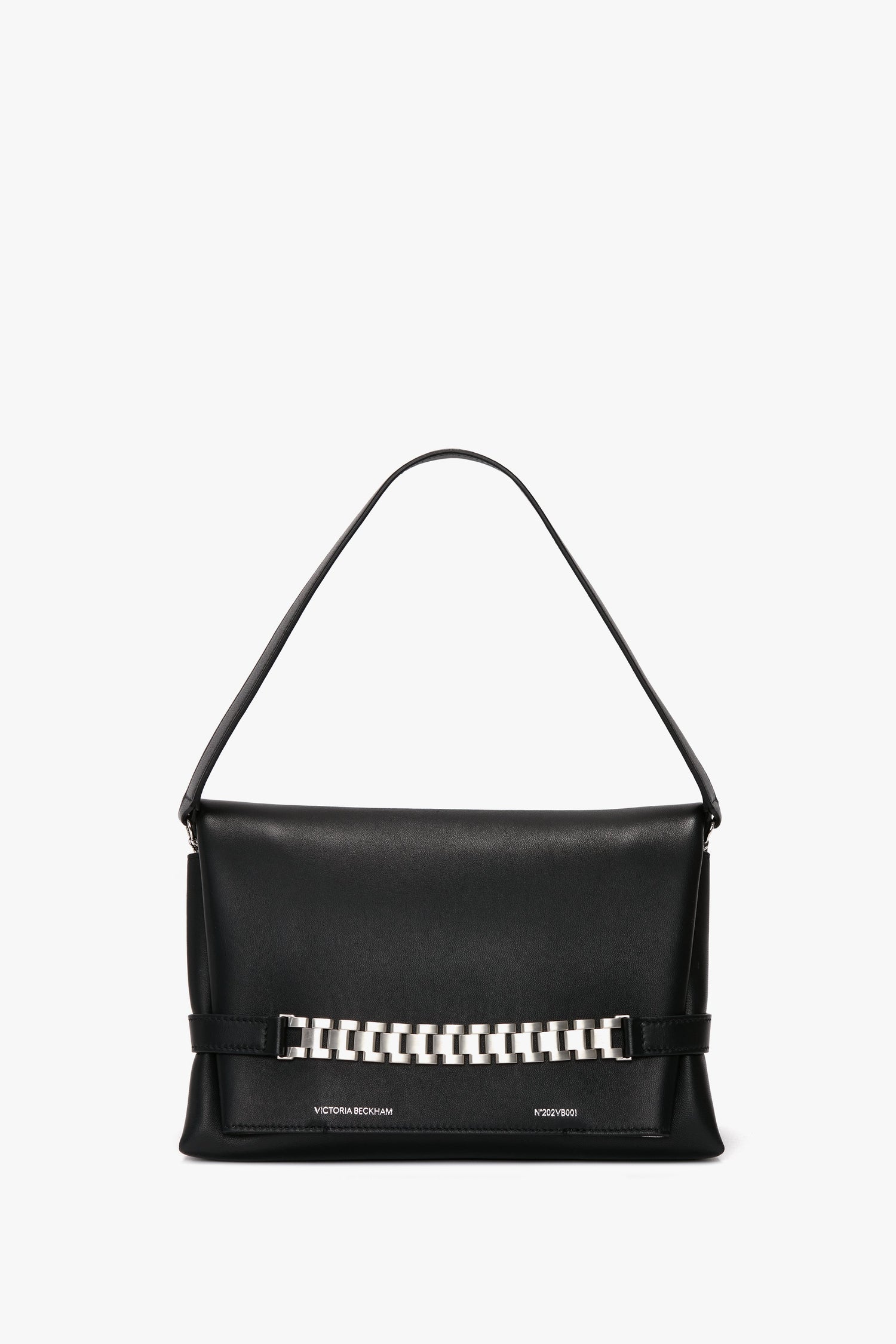 A Chain Pouch Bag with Brushed Silver Chain In Black Leather by Victoria Beckham, featuring a single handle and a brushed silver chain detail on the front, and a detachable strap for versatile styling.