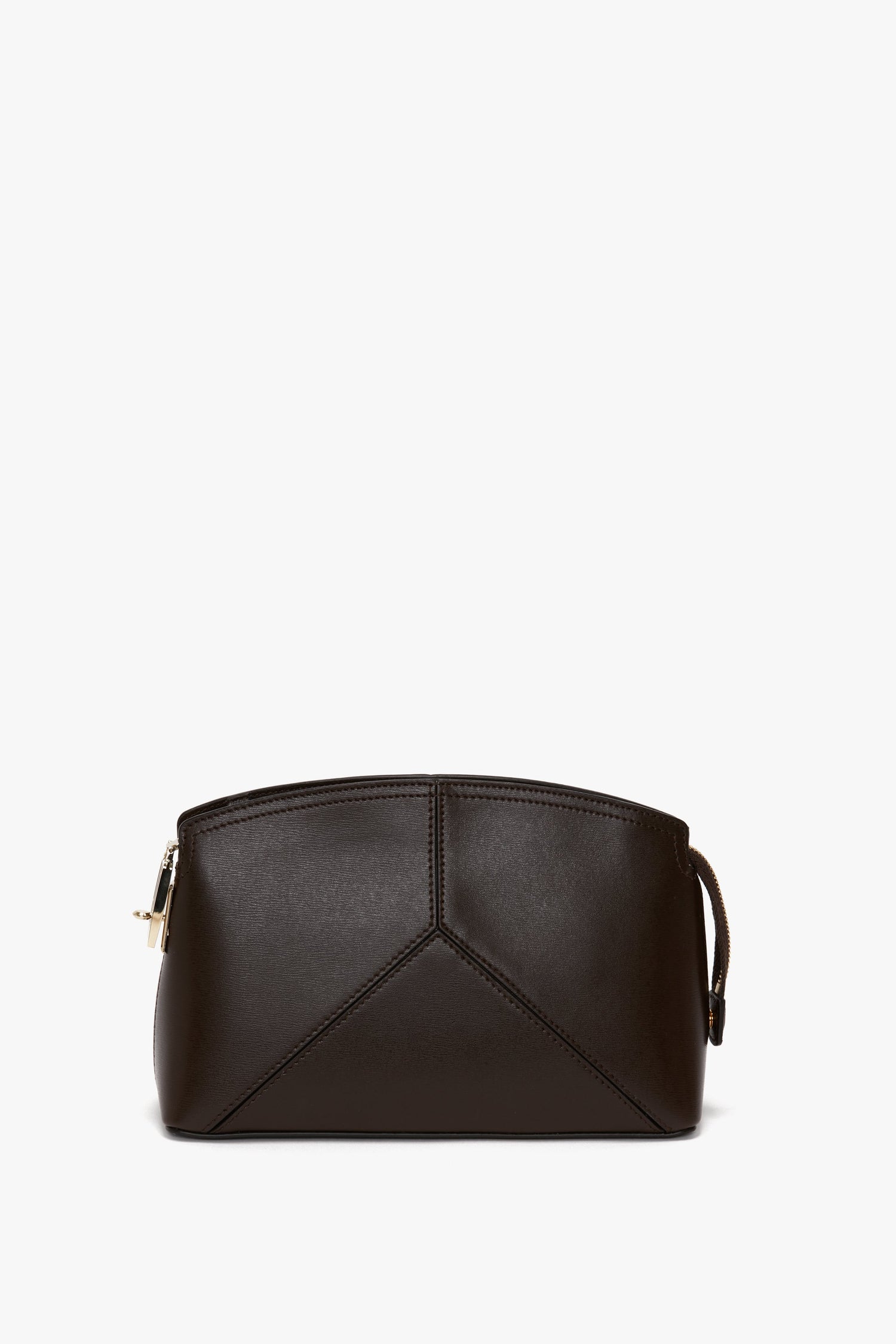 A small, structured Exclusive Victoria Crossbody Bag In Brown Leather by Victoria Beckham with sleek geometric lines, featuring a zipper closure and a short adjustable strap.